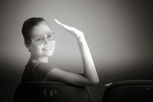 Woman watching movie at the cinema