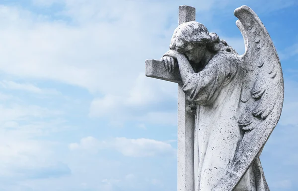 Angel and cross monument