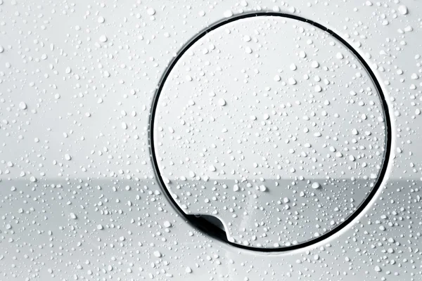 Fuel cap with raindrops