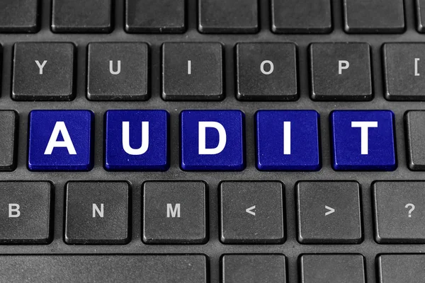 Accounting or tax audit word on keyboard