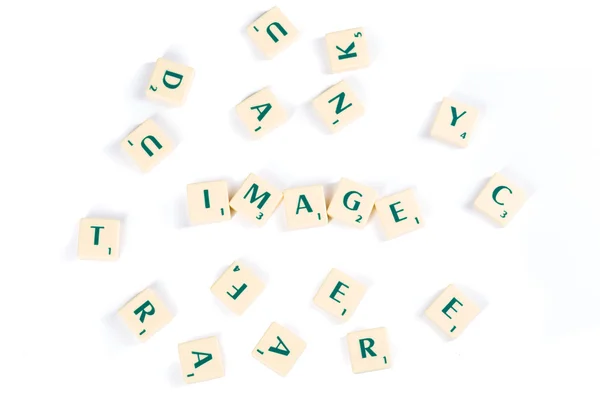 Scrabble Letter Tiles For Image Concept on White