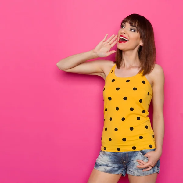 Shouting Happy Girl In Yellow Dotted Shirt