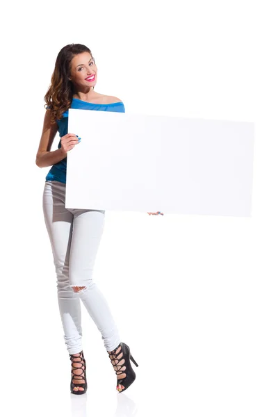 Cheerful Woman Holding Blank Poster