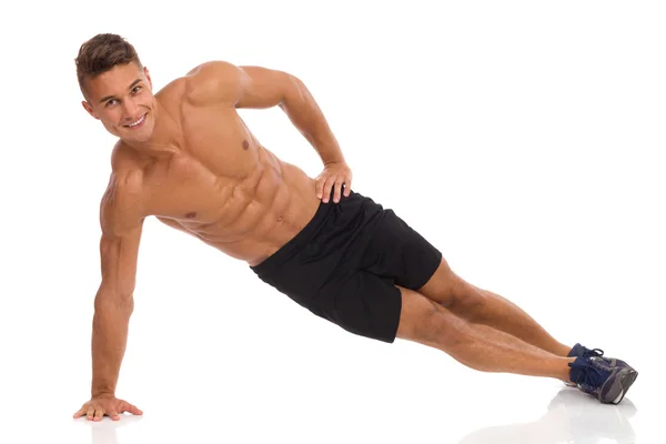 Side Plank. Isometric Stomach Exercise