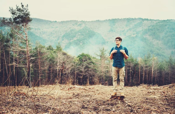 Hiker man standing in forest