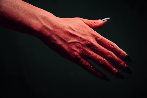 Devil hand with handshake gesture