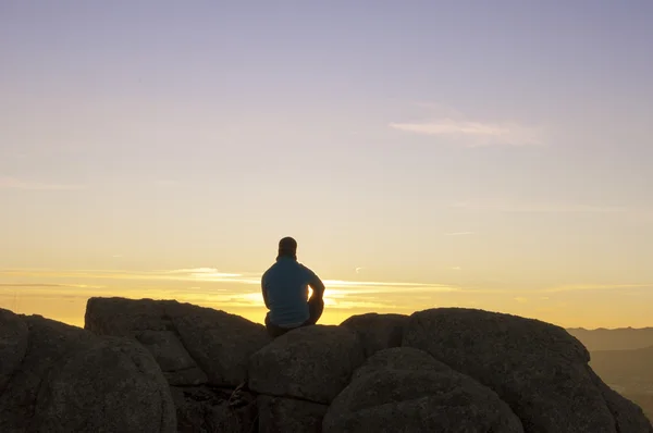 Man on top watching the sunset - 4