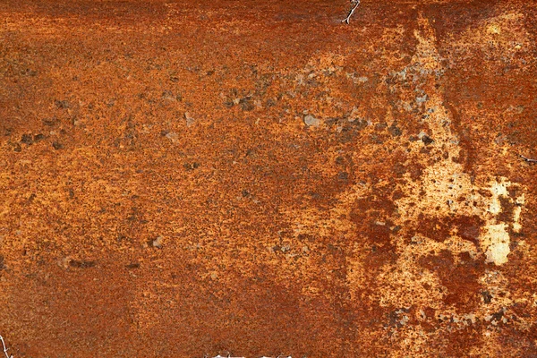 Red and brown rust on metal