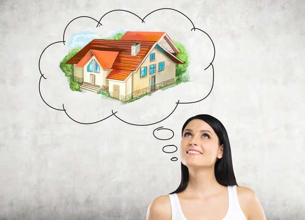 Woman thinking about real estate