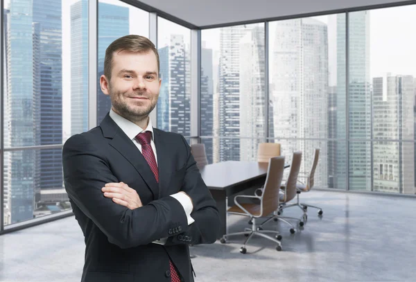 Confident consultant in a corner conference room. Modern office with huge windows and amazing Singaporean business area panoramic view.