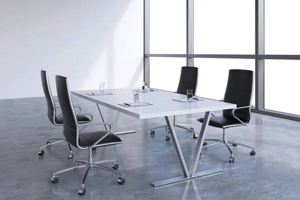 Modern meeting room with huge windows with copy space. Black leather chairs and a white table with legal pads on it. 3D rendering.