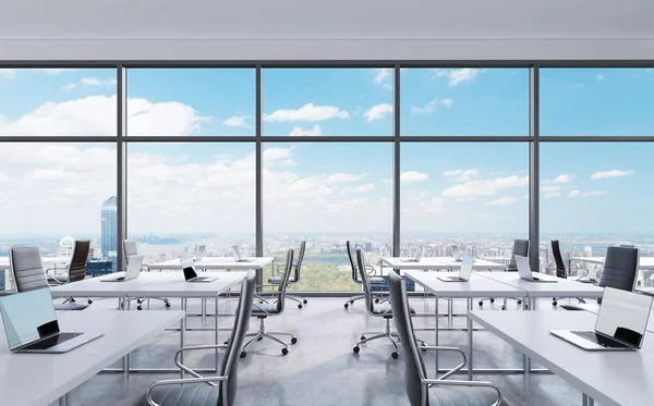 Workplaces in a modern panoramic office, New York city view from the windows. Open space. White tables and black leather chairs. A concept of financial consulting services. 3D rendering.