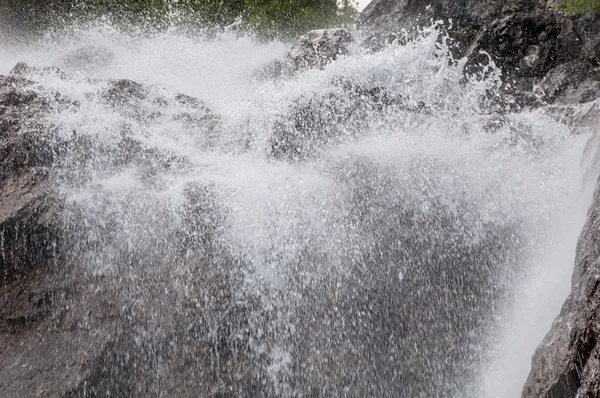 Waterfall rocks spray