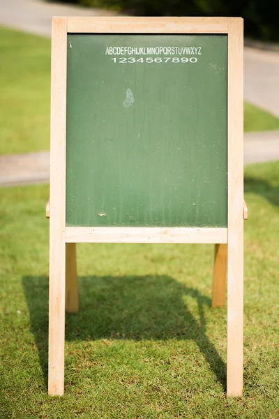 Green board in the park