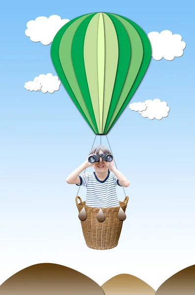 Little boy with binoculas in the hot air balloon Basket on white