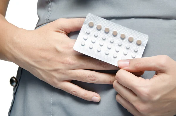 Woman holding contraceptive pills rotect for pregnant