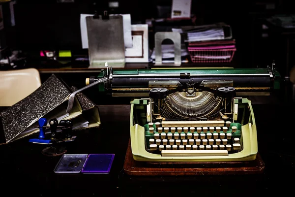 Vintage typewriter and old file
