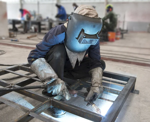 Welder in factory