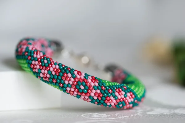 Beaded crochet bracelet with floral pattern