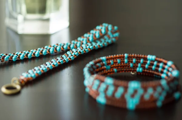 Wattled necklace and bracelet from beads