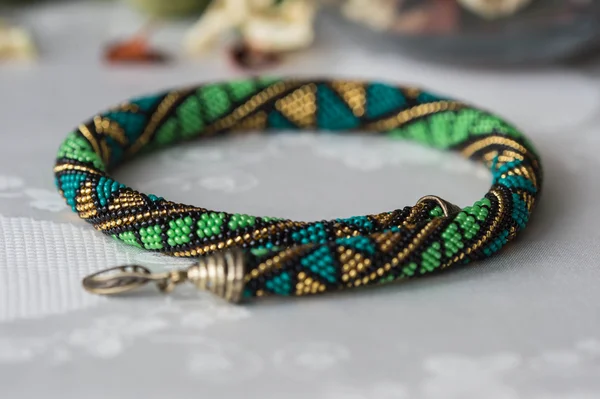 Handmade crochet beaded necklace with geometrical pattern
