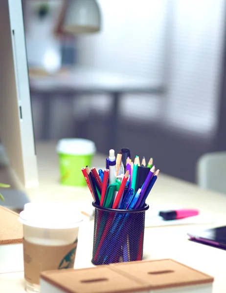 Designer desk with laptop in the office