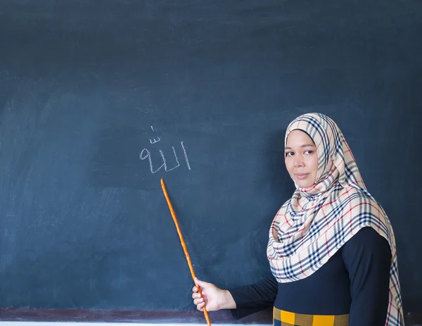 Muslim woman teaching islamic religion