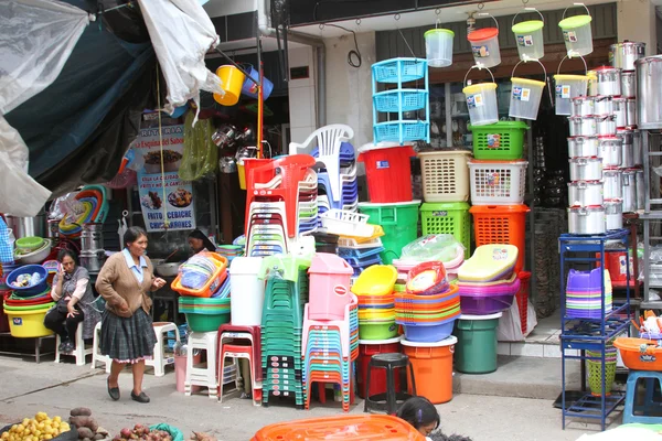 Street Scene in Cajamarca, Peru with Store Selling Plastic