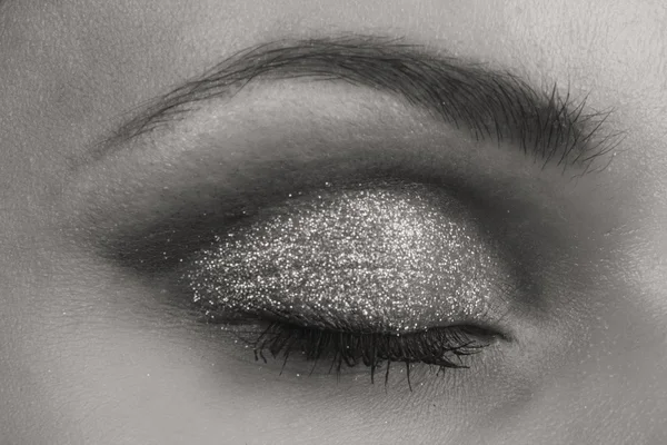 Fashion beauty make-up. Makeup with glitter. Art makeup, bright makeup.