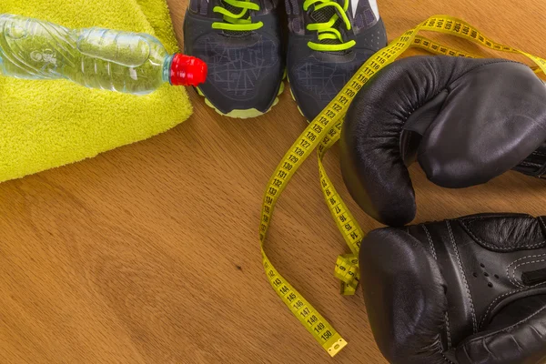 Boxing gloves on a wooden background