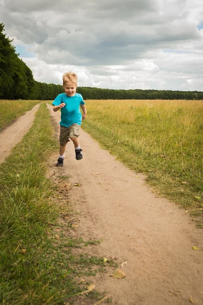 Boy running in nature