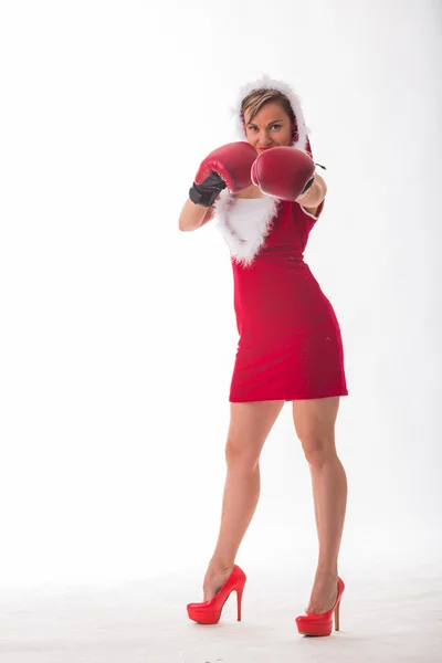 Woman posing in boxing gloves
