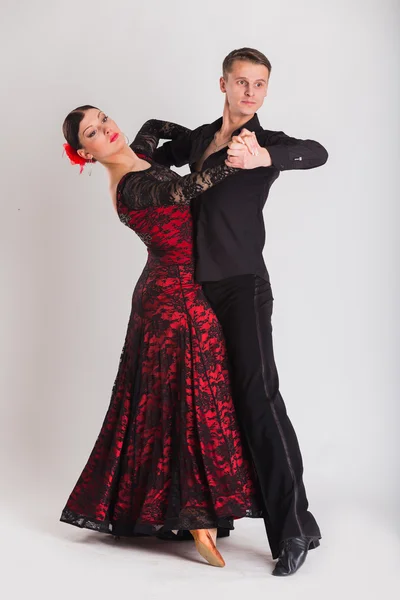 Man and woman posing in dance pose.