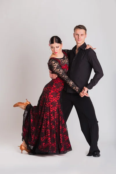 Man and woman posing in dance pose.