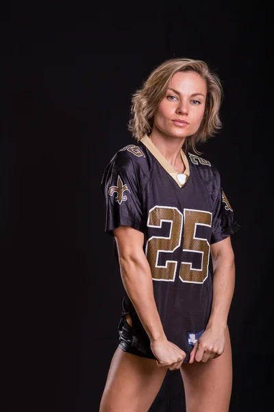 Athletic girl on a black background