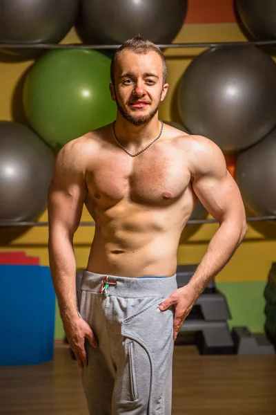 Muscular man in the gym