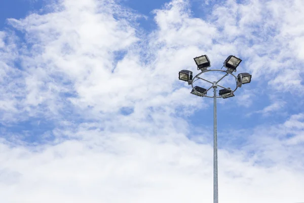 Street light pole on sky background