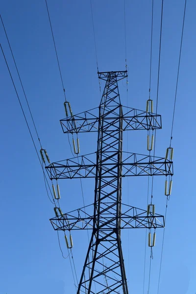 Power line against the blue sky