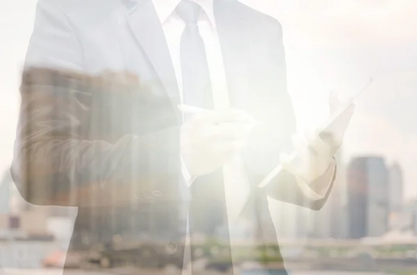 Businessman with cityscape building