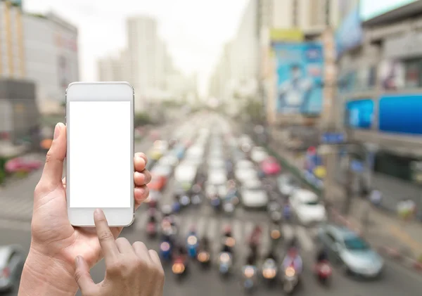 Female hand holding smart phone