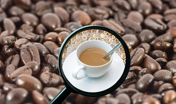 Magnifying glass with background of roasted coffee beans to be coffee cup, food and drink with business concept