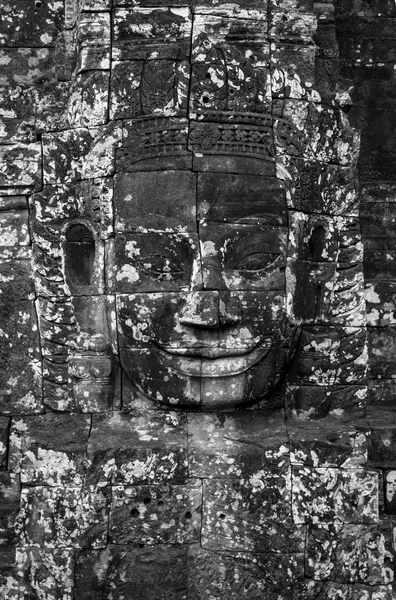 Closeup the Stone face of Ancient Bayon Temple at Angkor Thom. Siem Reap, Cambodia