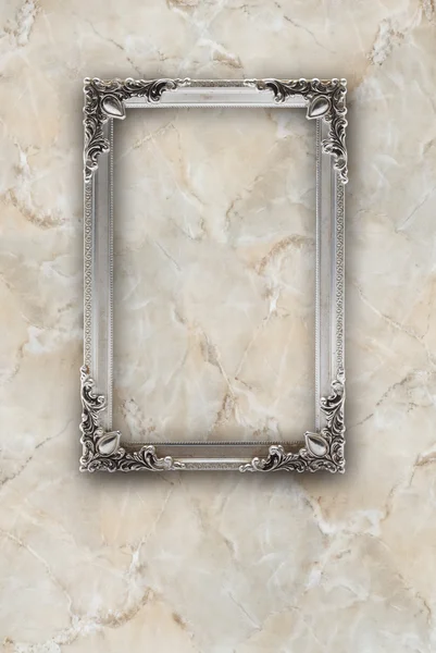 Old silver picture frame on the marble effects background
