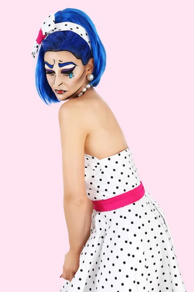 Model makeup with blue wig, on pink background, pop concept