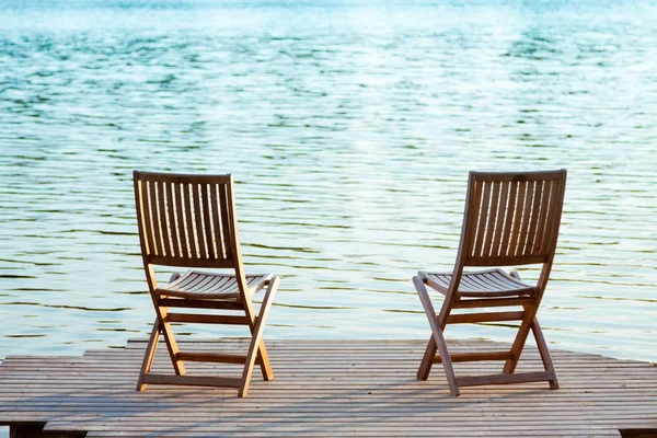 Two chairs on dock
