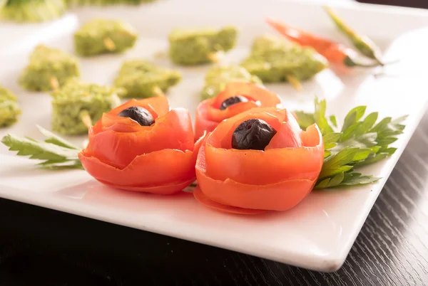 Decorative Tomatoes with Chicken lollipops