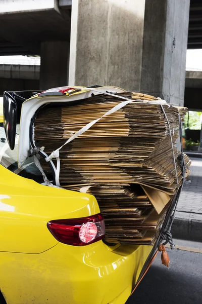 Car trunk full of paper boxes for reuse or recycle