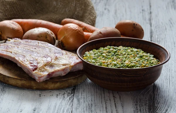 Dried peas and assorted ingredients for pea soup recipe