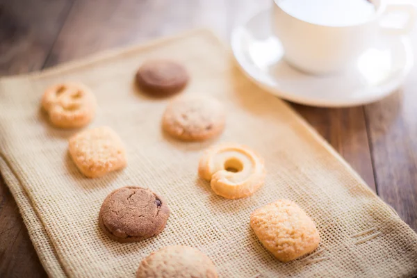 Cup of coffee and Many shapes biscuit