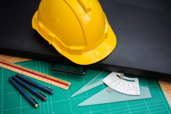 Yellow Safety Helmet Hat and Drawing Tools